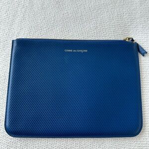 Comme des Garçons blue leather clutch